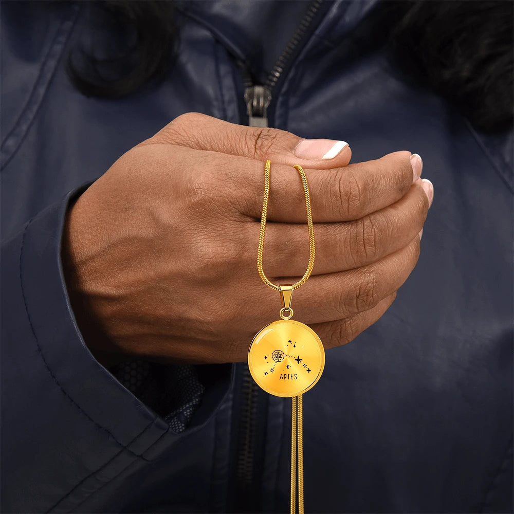 18k Yellow Gold Engraved Aries Zodiac Star Sign Circle Necklace Showcase In Hand