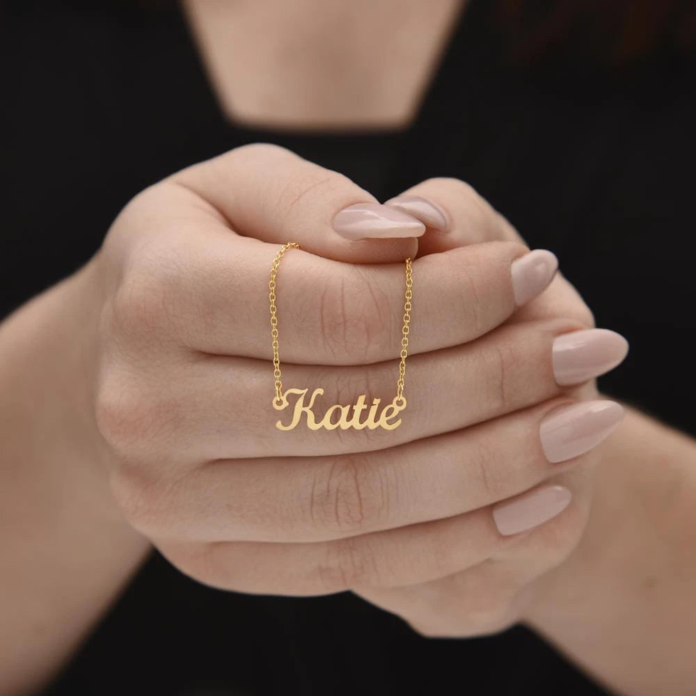 18k yellow gold custom name necklace for her showcase in hand