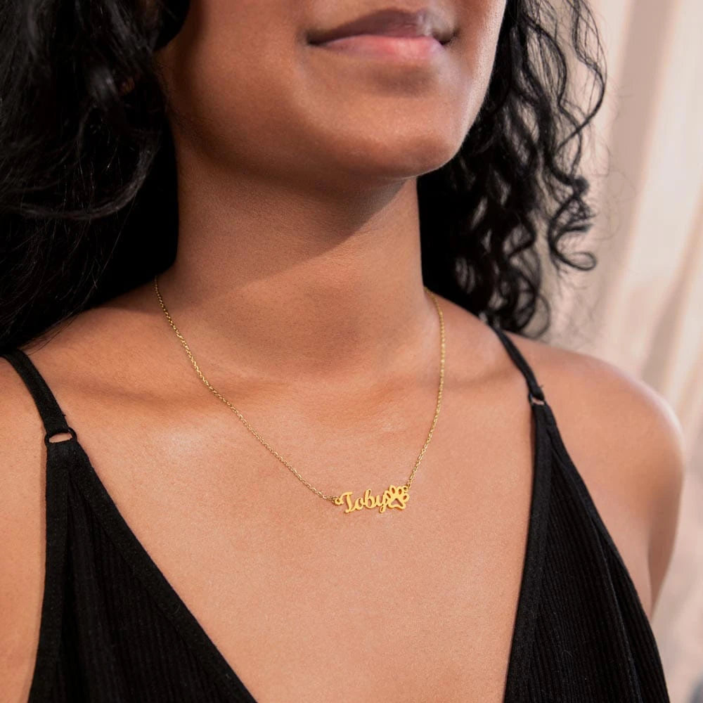 18k yellow gold personalized paw print name necklace for pet lover showcase on neck