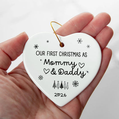 To New Parents Ceramic Heart Ornament 2026 Our First Christmas as Mommy and Daddy Display In Hand