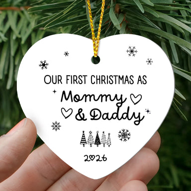 To New Parents High Gloss Heart Ornament Our First Christmas as Mommy and Daddy Display In Hand