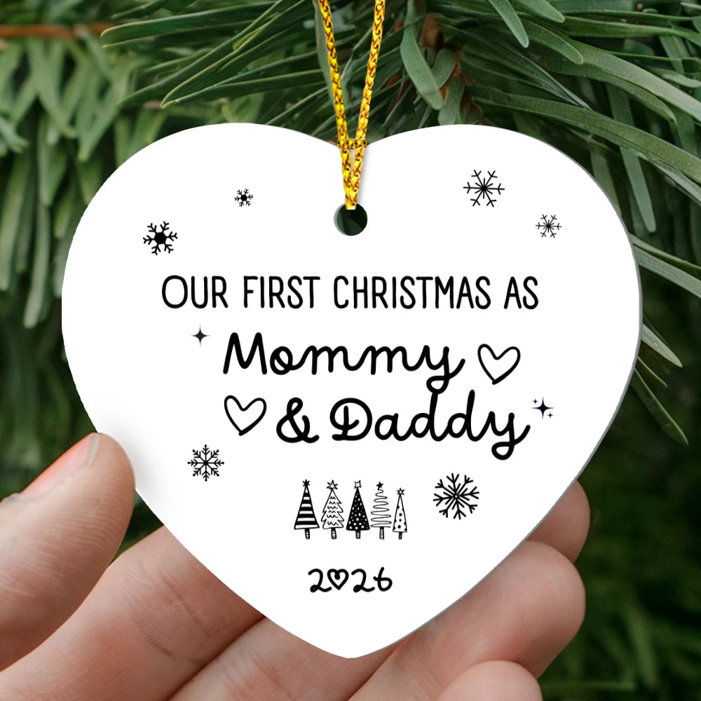 To New Parents High Gloss Heart Ornament Our First Christmas as Mommy and Daddy Display In Hand