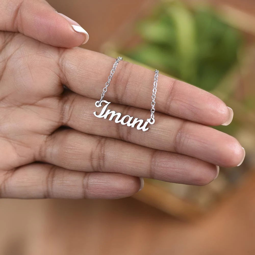 polished stainless steel custom name necklace fo her showcase in hand