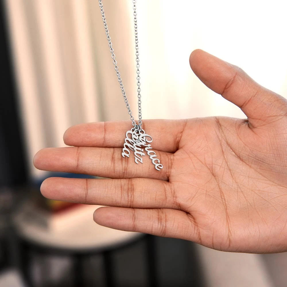 polished stainless steel personalized three vertical names necklace showcase in hand